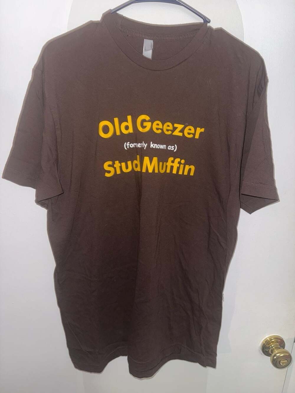 Graphic T-Shirt 'Old Geezer (formerly as) Stud Muffin'